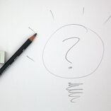 Strategy lightbulb with question mark